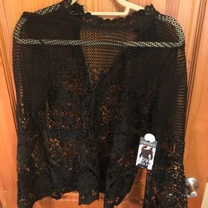 High neck bell sleeve black lace shirt.